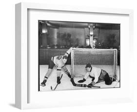 There's a Goal Mouth Scramble During This Game of Ice Hockey-null-Framed Photographic Print