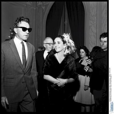 Elizabeth Taylor and Her Husband Richard Burton at a Party