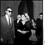 Elizabeth Taylor and Her Husband Richard Burton at a Party-Therese Begoin-Laminated Photographic Print