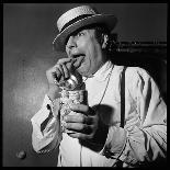 Raymond Devos Eating a Candy-Thérese Begoin-Photographic Print