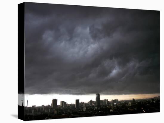 Thick Dark Cloud Hangs over Jakarta, Indonesia, before a Thunder Storm-null-Stretched Canvas