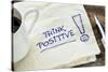 Think Positive - Motivational Slogan on a Napkin with a Cup of Coffee-PixelsAway-Stretched Canvas