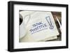 Think Positive - Motivational Slogan on a Napkin with a Cup of Coffee-PixelsAway-Framed Photographic Print