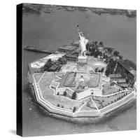 This Aerial View Shows the Statue of Liberty on Liberty Island-null-Stretched Canvas