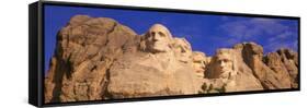 This Is a Close Up View of Mount Rushmore National Monument Against a Blue Sky-null-Framed Stretched Canvas