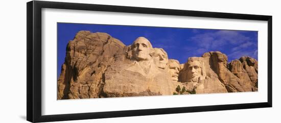 This Is a Close Up View of Mount Rushmore National Monument Against a Blue Sky-null-Framed Premium Photographic Print