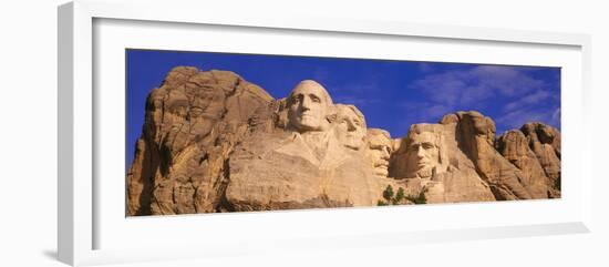 This Is a Close Up View of Mount Rushmore National Monument Against a Blue Sky-null-Framed Photographic Print