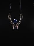 Teenage (16-17) Male Gymnast Practicing on Rings against Black Background-Thomas Barwick-Photographic Print