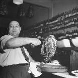 Cook in the Napoli Restaurant Holding up an Octopus, a Delicacy in Argentina-Thomas D^ Mcavoy-Photographic Print