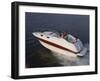 Three Adults on a Motorboat-null-Framed Photographic Print