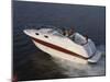 Three Adults on a Motorboat-null-Mounted Photographic Print