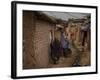 Three Afghan Refugee Women and their Children Walk in an Alley of a Poor Neighborhood in Pakistan-null-Framed Photographic Print