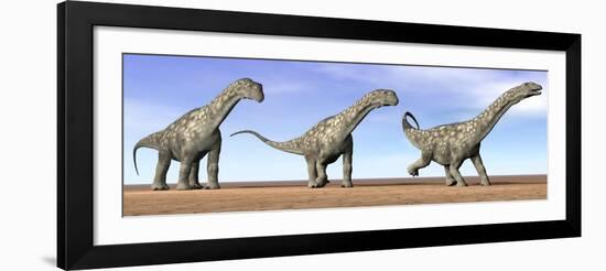 Three Argentinosaurus Dinosaurs Standing in the Desert-null-Framed Art Print