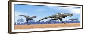 Three Aucasaurus Dinosaurs Running in the Desert-null-Framed Premium Giclee Print