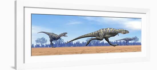 Three Aucasaurus Dinosaurs Running in the Desert-null-Framed Art Print