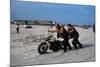 Three Bikers Take the Sand Off their Chromium-Plated Motorbikes-Mario de Biasi-Mounted Photographic Print