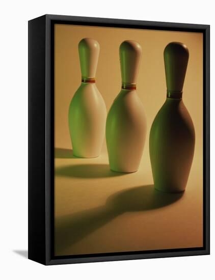 Three Bowling Pins in a Line-null-Framed Stretched Canvas