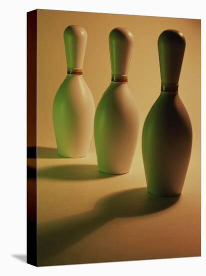 Three Bowling Pins in a Line-null-Stretched Canvas