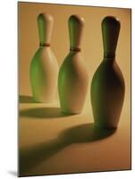 Three Bowling Pins in a Line-null-Mounted Premium Photographic Print