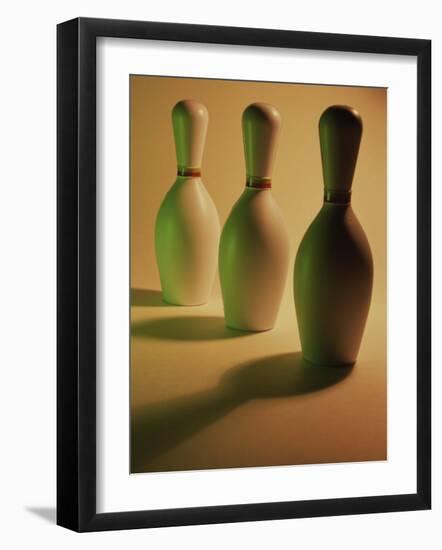 Three Bowling Pins in a Line-null-Framed Photographic Print