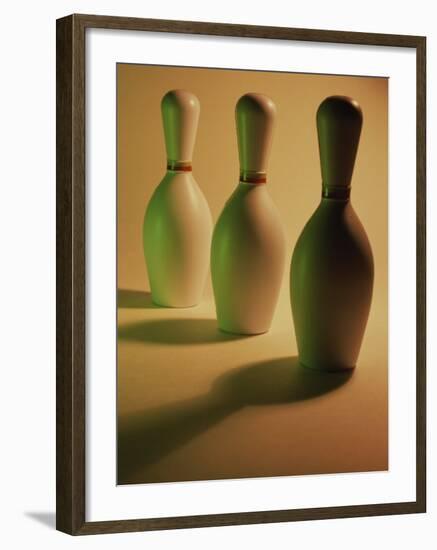 Three Bowling Pins in a Line-null-Framed Photographic Print