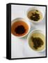 Three Bowls of Different Types of Tea-Véronique Leplat-Framed Stretched Canvas