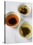 Three Bowls of Different Types of Tea-Véronique Leplat-Stretched Canvas