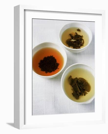 Three Bowls of Different Types of Tea-Véronique Leplat-Framed Photographic Print