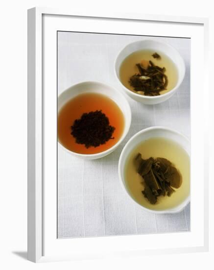 Three Bowls of Different Types of Tea-Véronique Leplat-Framed Photographic Print