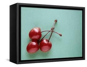 Three Cherries on a Green Background-Karen M^ Romanko-Framed Stretched Canvas