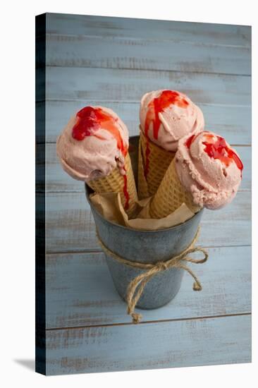 Three Cones, Each with One Scoop of Homemade Strawberry Ice Cream, Held in a Metal Container-Cynthia Classen-Stretched Canvas