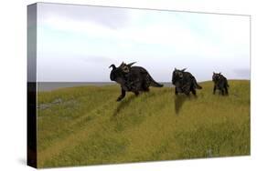 Three Einiosaurus Dinosaurs Walking across a Grassy Field-null-Stretched Canvas