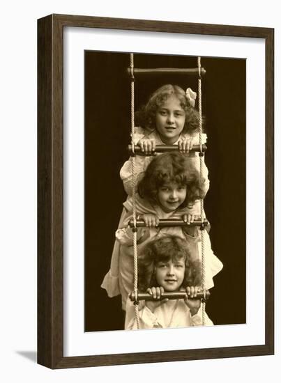 Three Girls on Rope Ladder-null-Framed Art Print