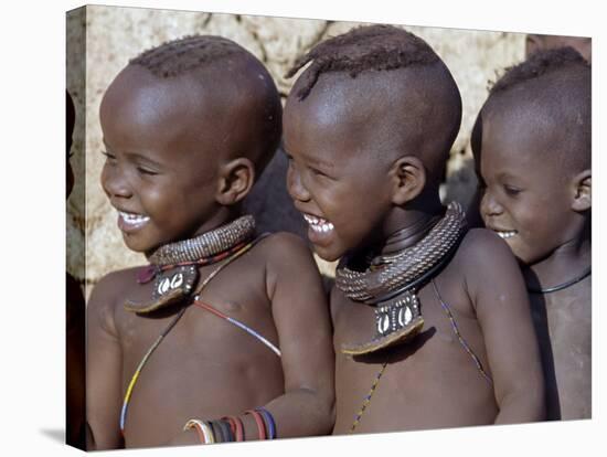 Three Happy Himba Children Enjoy Watching a Dance, Namibia-Nigel Pavitt-Stretched Canvas