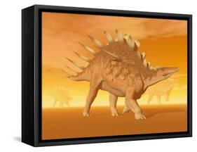 Three Kentrosaurus Dinosaurs in the Desert with Hazy Sunset Light-null-Framed Stretched Canvas