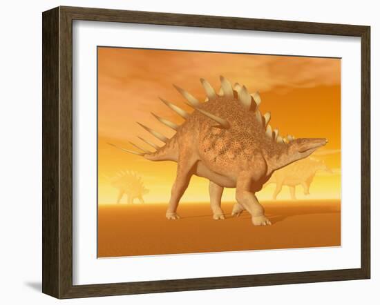 Three Kentrosaurus Dinosaurs in the Desert with Hazy Sunset Light-null-Framed Art Print