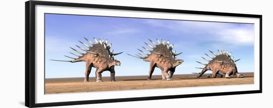 Three Kentrosaurus Dinosaurs Standing in the Desert-null-Framed Premium Giclee Print