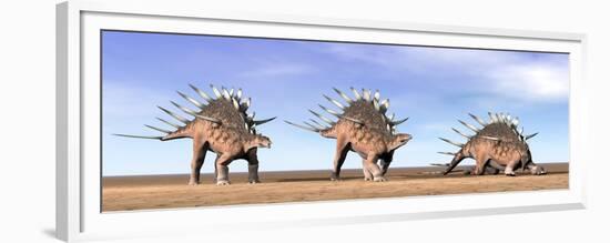 Three Kentrosaurus Dinosaurs Standing in the Desert-null-Framed Premium Giclee Print