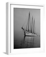 Three-Masted Schooner, Sails Furled, on the Water with a Dinghy in Tow-Bernard Hoffman-Framed Photographic Print