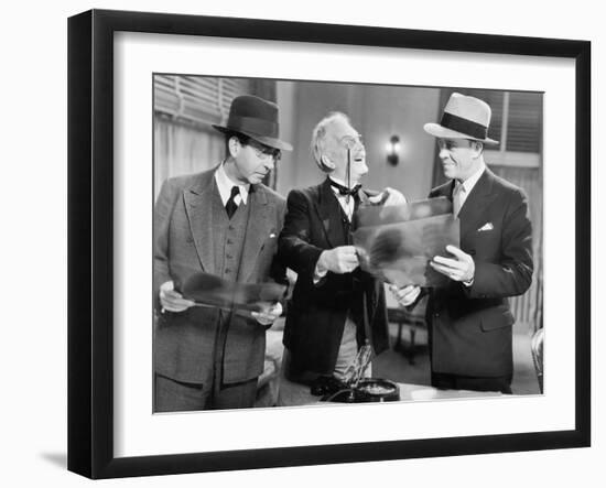 Three Men Looking at X-Rays-null-Framed Photo