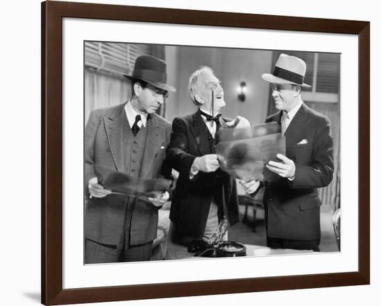 Three Men Looking at X-Rays-null-Framed Photo