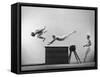 Three Men of Danish Gymnastic Team Performing a Tiger Leap-Gjon Mili-Framed Stretched Canvas