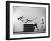 Three Men of Danish Gymnastic Team Performing a Tiger Leap-Gjon Mili-Framed Photographic Print