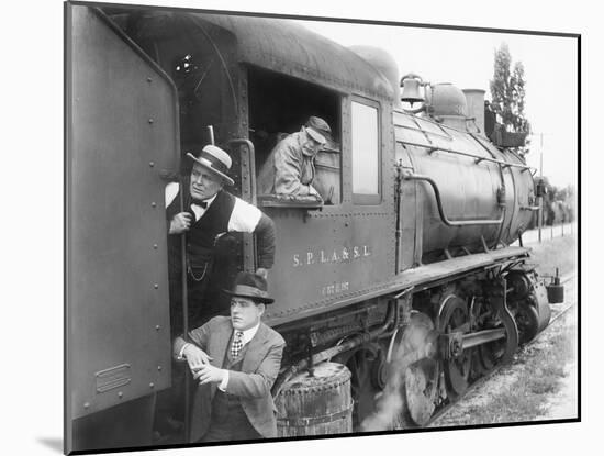 Three Men Waiting at a Steam Locomotive-null-Mounted Photo