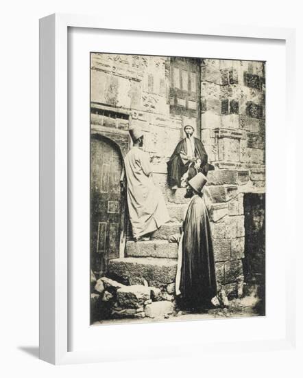 Three Mevlevi Dervishes Outside Ancient Buildings-null-Framed Photographic Print