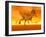 Three Monolophosaurus Dinosaurs in the Desert by Sunset-null-Framed Art Print