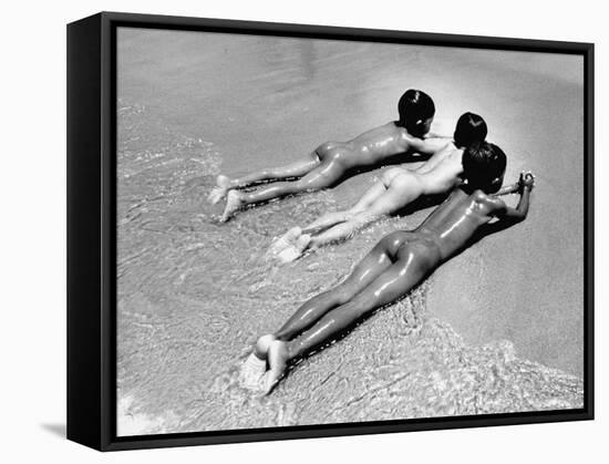 Three Native Boys Sunbathing Nude at the Edge of the Surf at Ocean Beach-Howard Sochurek-Framed Stretched Canvas