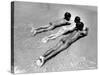 Three Native Boys Sunbathing Nude at the Edge of the Surf at Ocean Beach-Howard Sochurek-Stretched Canvas