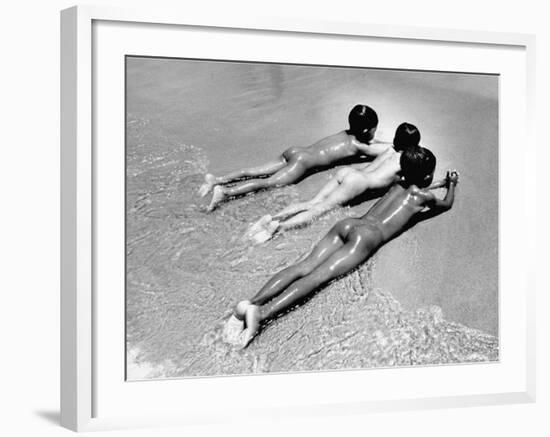 Three Native Boys Sunbathing Nude at the Edge of the Surf at Ocean Beach-Howard Sochurek-Framed Photographic Print