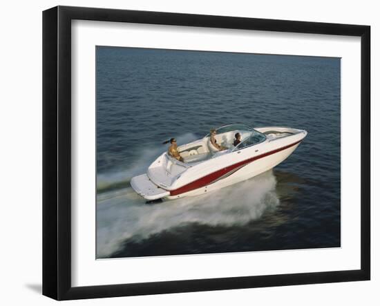 Three People in a Motorboat-null-Framed Photographic Print